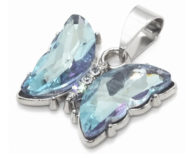 Dije de acero quirurgico mariposa con cubic celeste 22mm